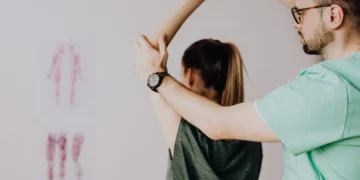 Physiotherapist providing one-on-one rehabilitation care to a patient